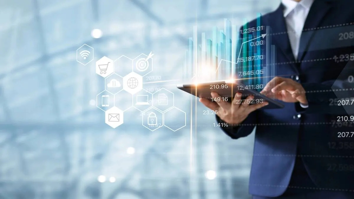 Businessman analysing growth data on a tablet