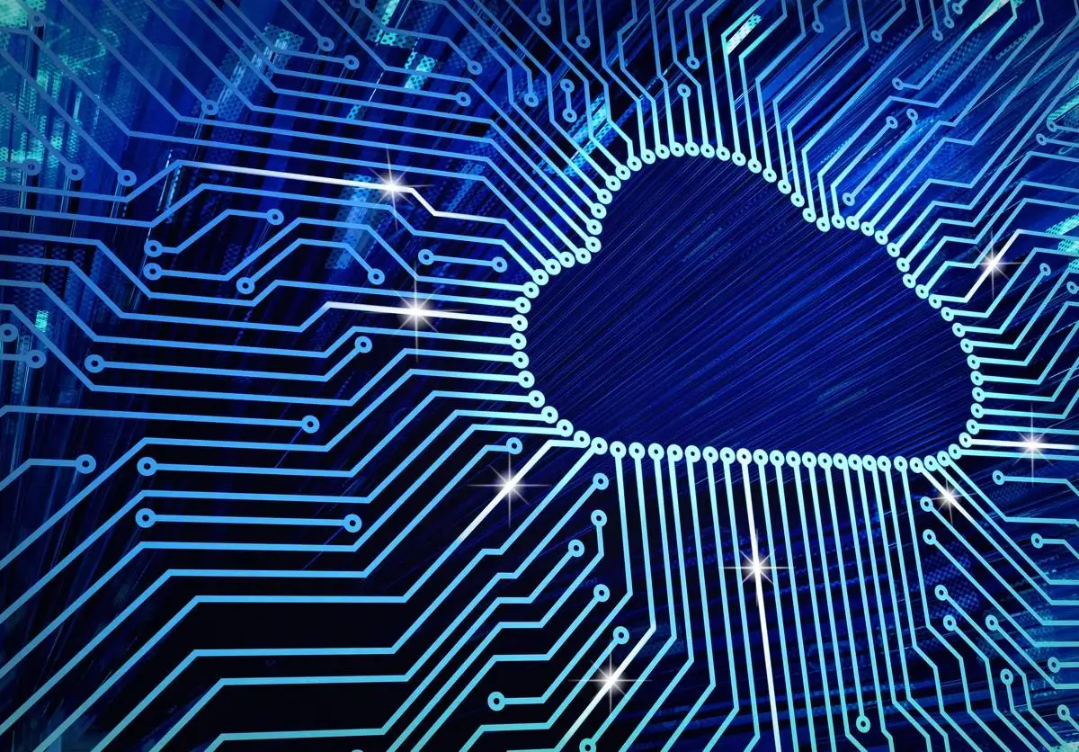 Cloud symbol on a glowing circuit board
