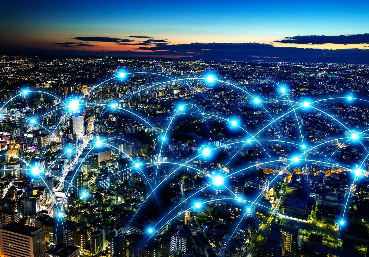 City at night connected by a digital network